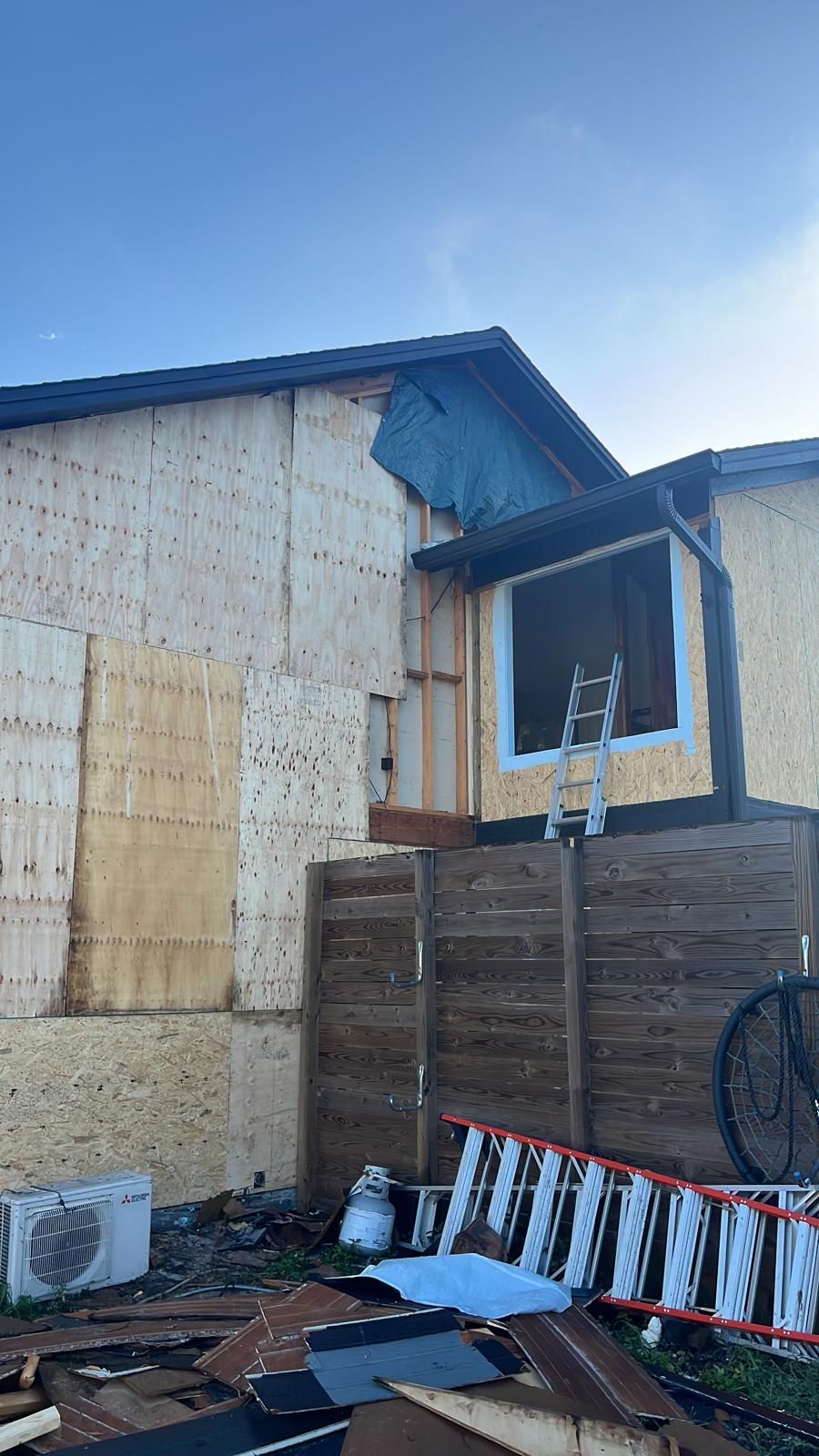 New construction home receiving lap siding installation in Central Florida — photo 3