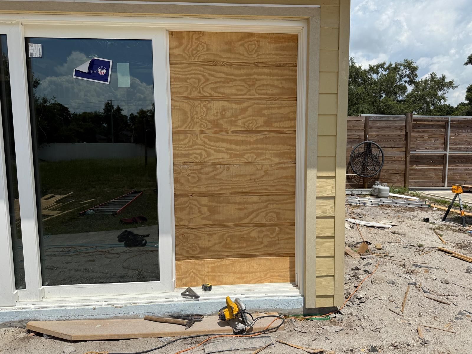 New construction home receiving lap siding installation in Central Florida — photo 10