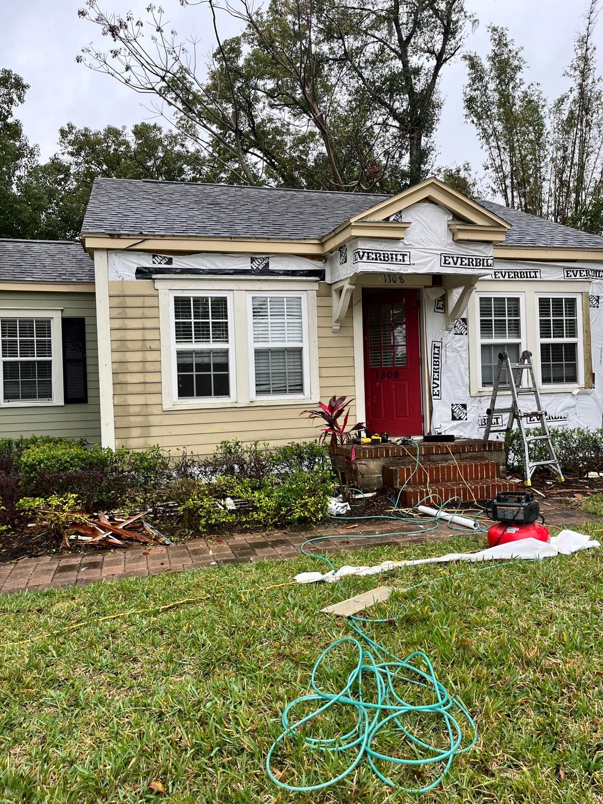 Orlando bungalow being re-sided with new lap siding and trim — photo 8