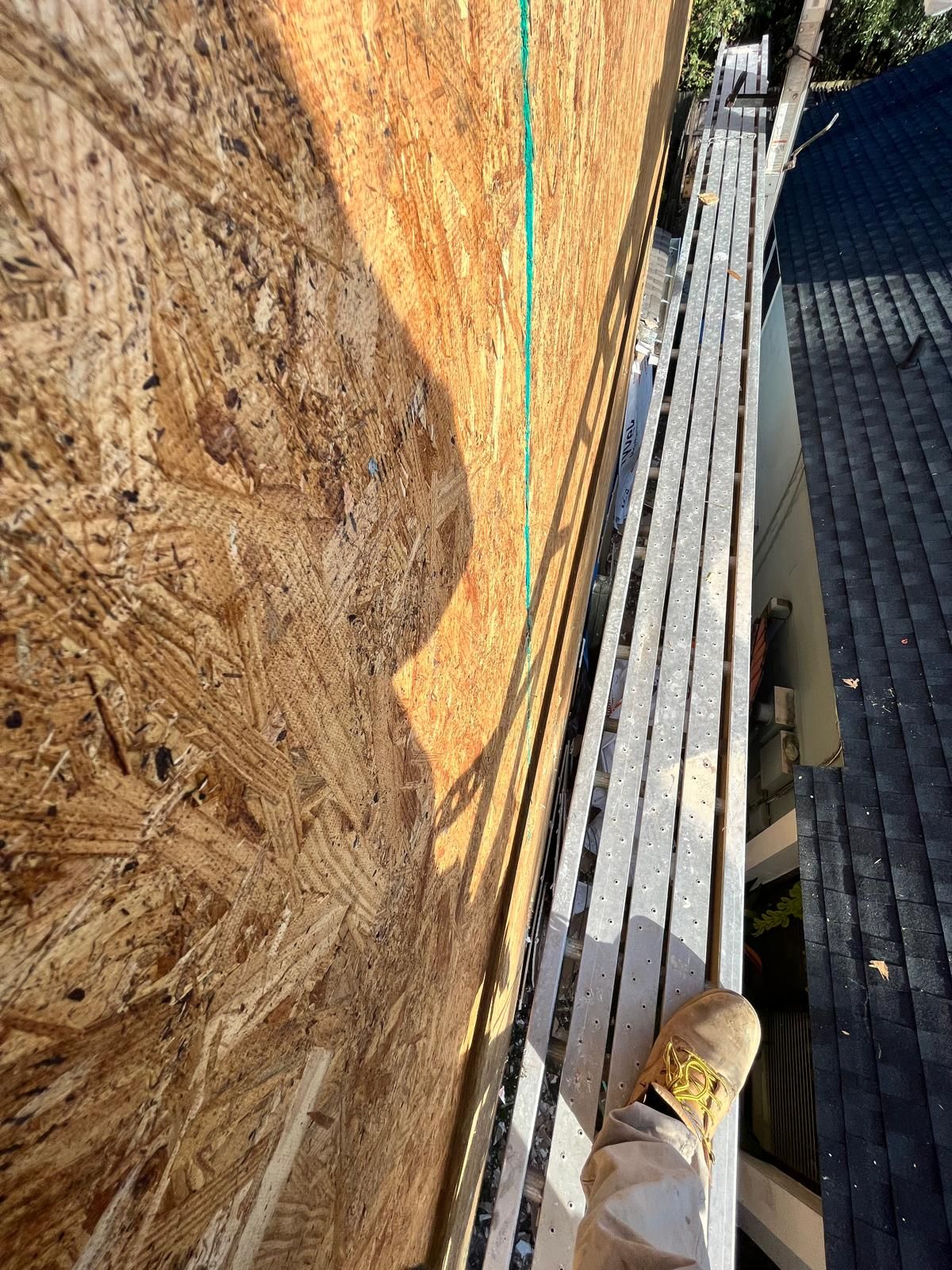 Whole-home siding replacement with new weather barrier and lap siding — photo 5