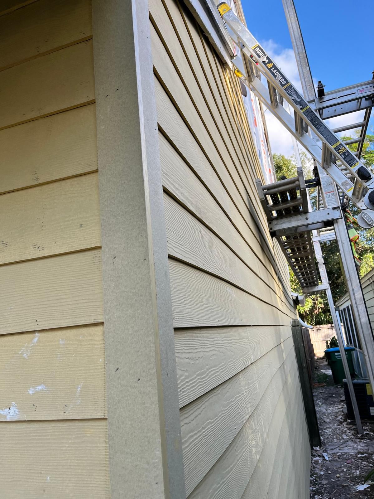 Whole-home siding replacement with new weather barrier and lap siding — photo 12