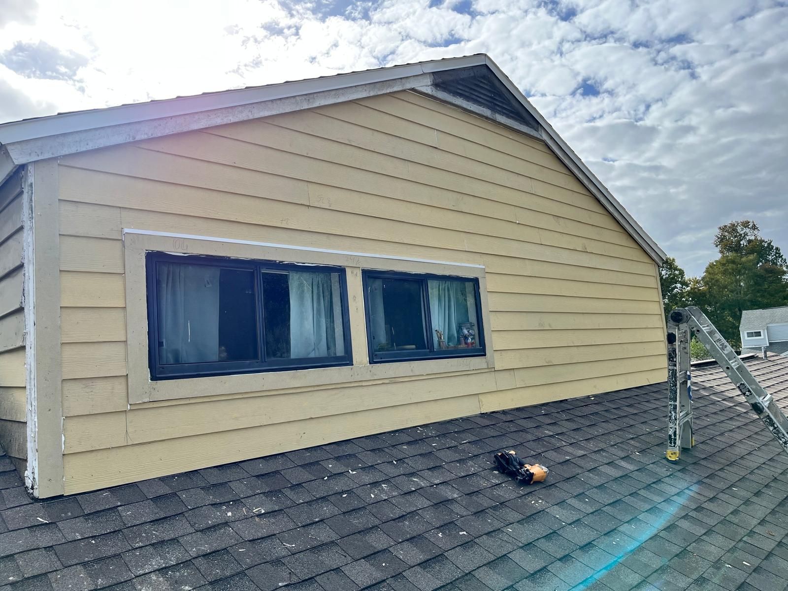 Whole-home siding replacement with new weather barrier and lap siding — photo 21