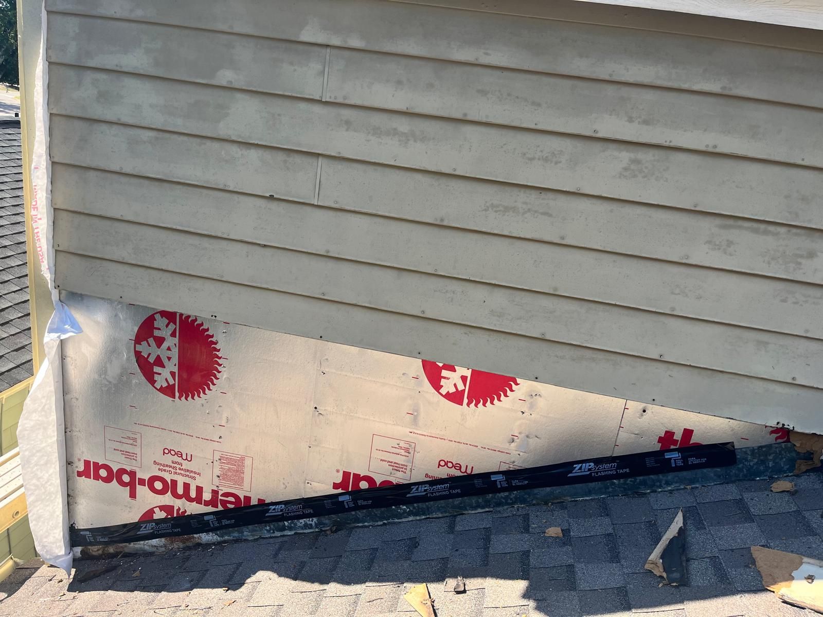 Whole-home siding replacement with new weather barrier and lap siding — photo 28