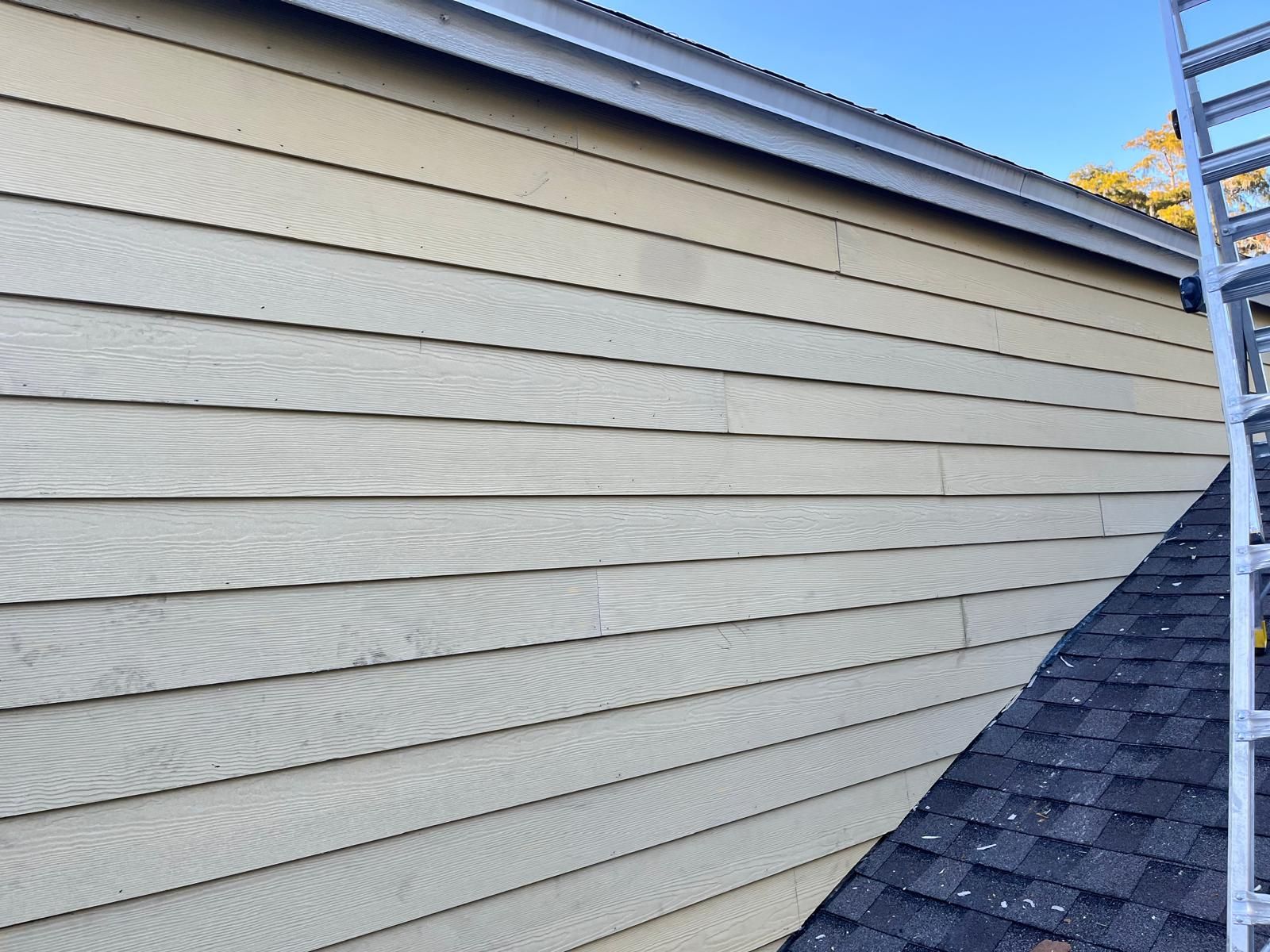 Whole-home siding replacement with new weather barrier and lap siding — photo 39