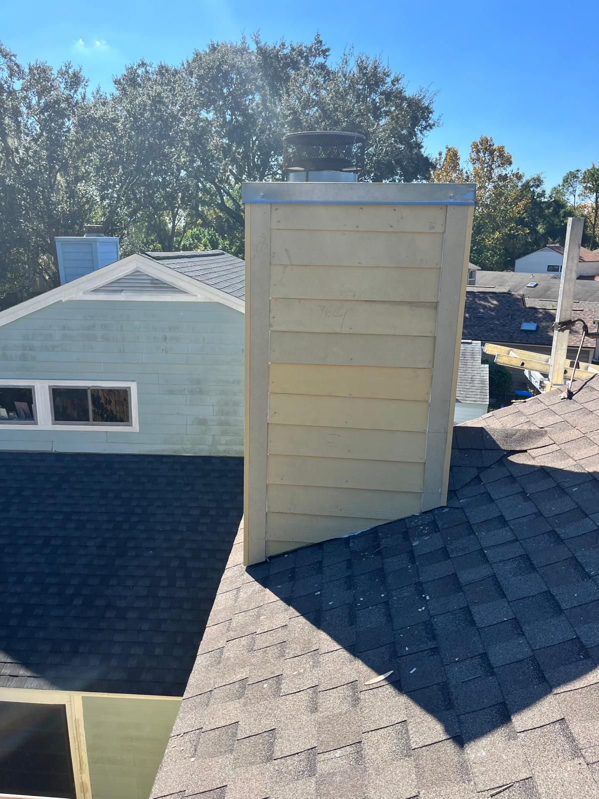 Whole-home siding replacement with new weather barrier and lap siding — photo 42