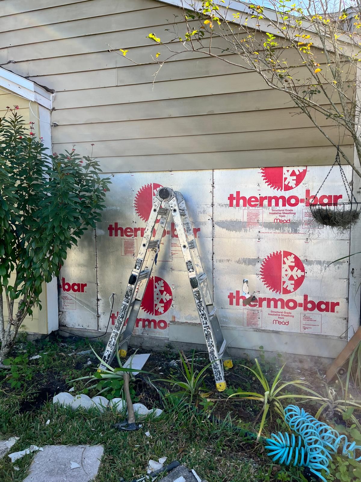 Whole-home siding replacement with new weather barrier and lap siding — photo 44