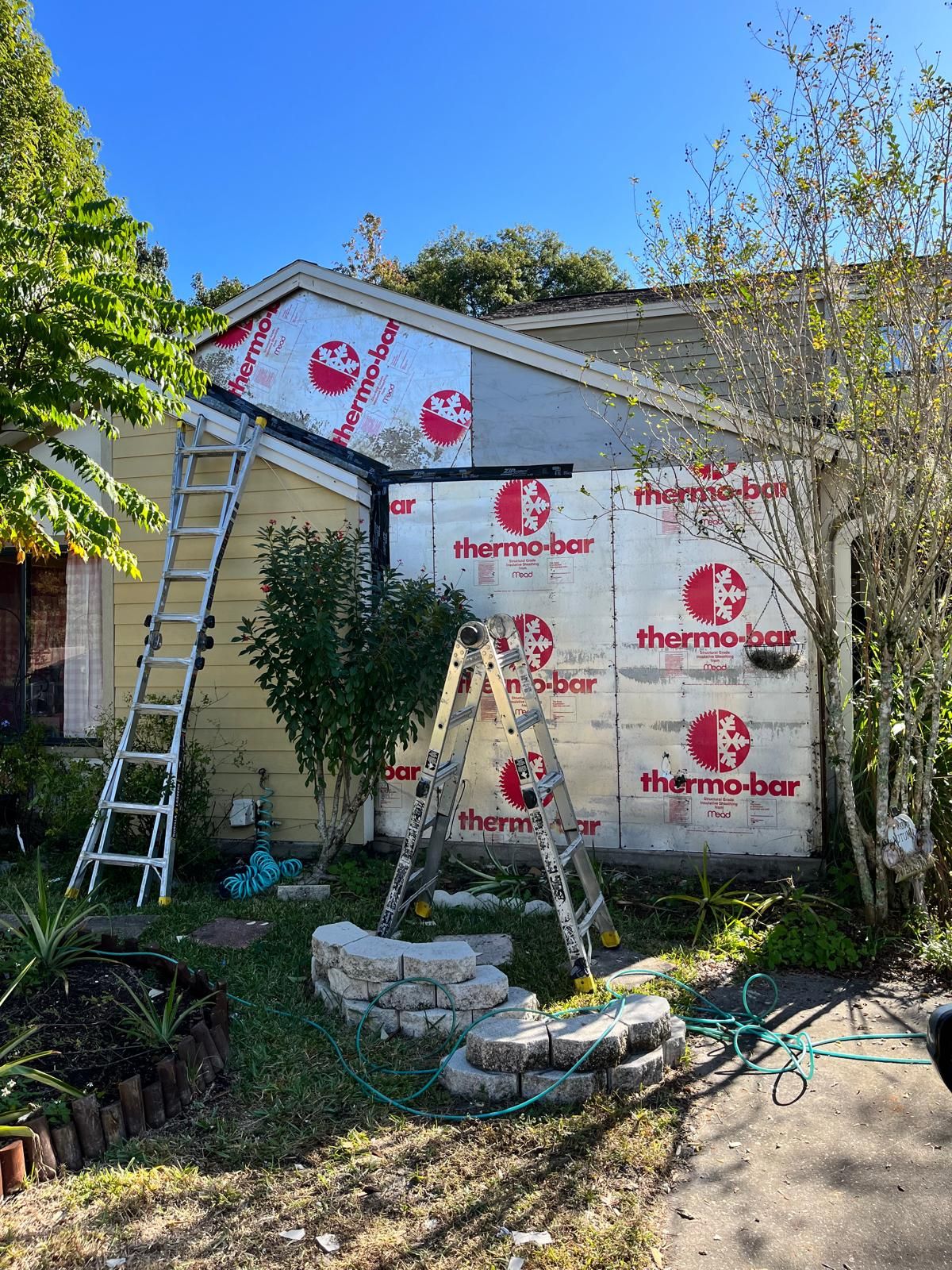 Whole-home siding replacement with new weather barrier and lap siding — photo 45