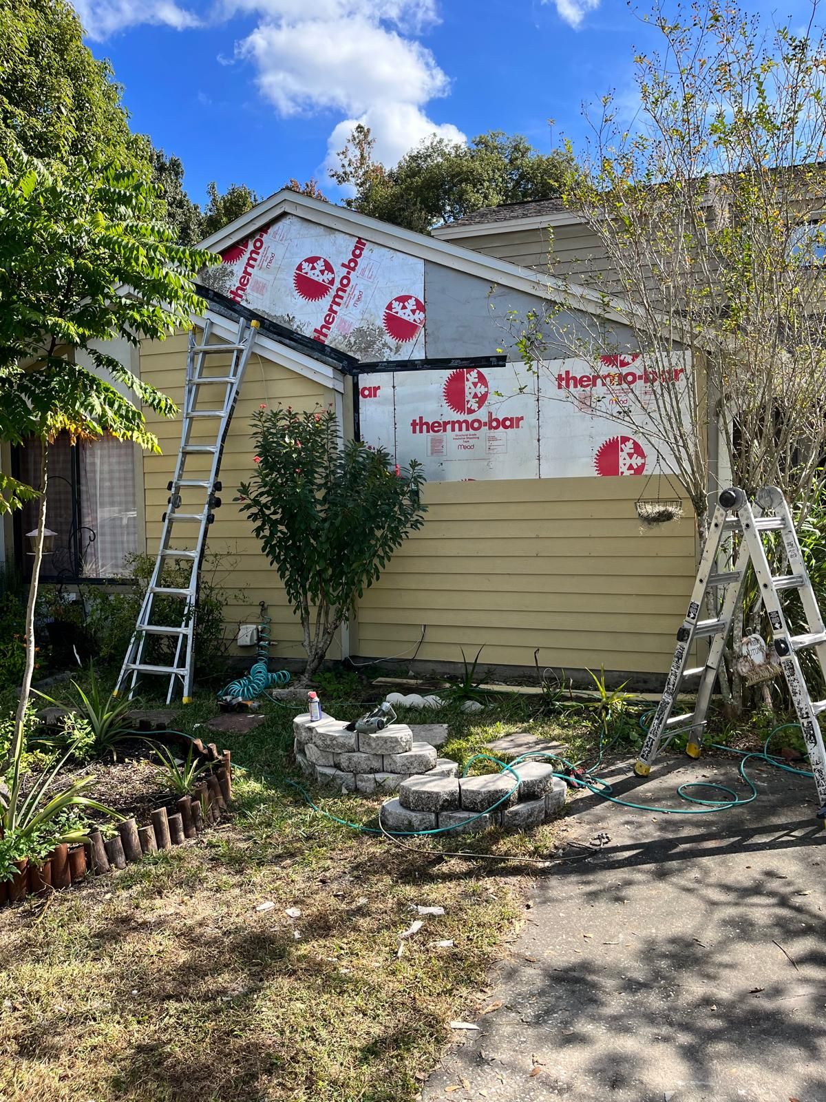 Whole-home siding replacement with new weather barrier and lap siding — photo 46